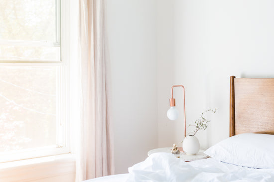 bedroom with white lamp